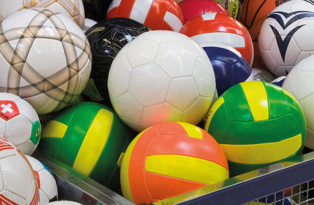 Plenty of coloured volleyballs in the supermarket